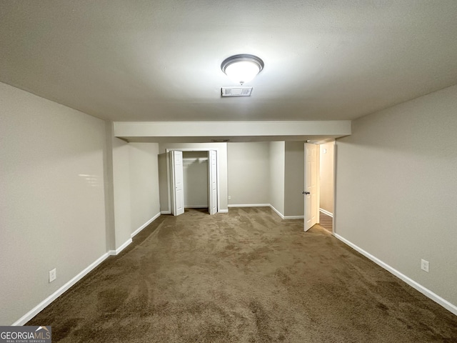 basement featuring carpet