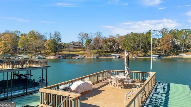 dock area with a deck with water view