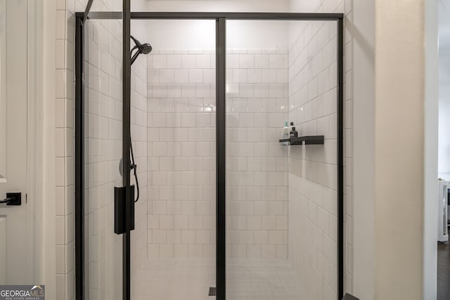 bathroom featuring an enclosed shower