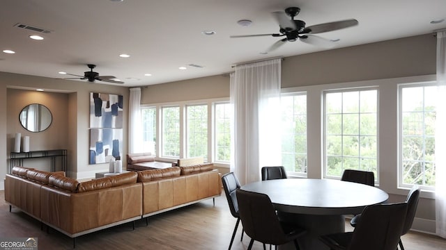 dining room featuring ceiling fan and light hardwood / wood-style flooring