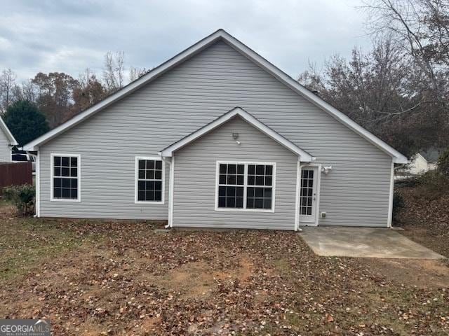 rear view of house featuring a patio area