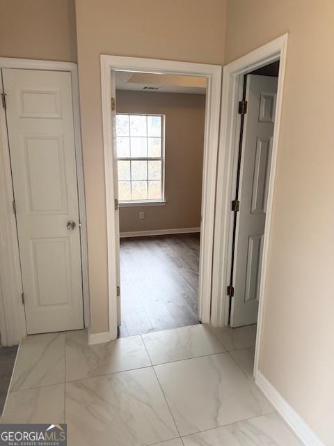 hall featuring light hardwood / wood-style flooring