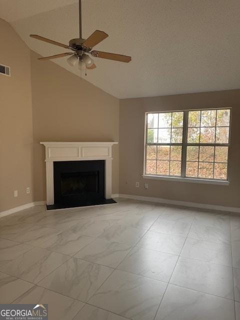 unfurnished living room with high vaulted ceiling and ceiling fan