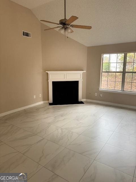 unfurnished living room with ceiling fan, high vaulted ceiling, and a textured ceiling