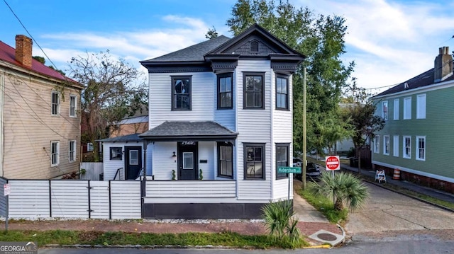 victorian home featuring a porch