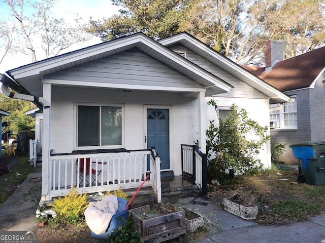 bungalow-style home featuring covered porch