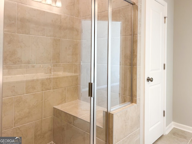 bathroom featuring tile patterned floors and walk in shower