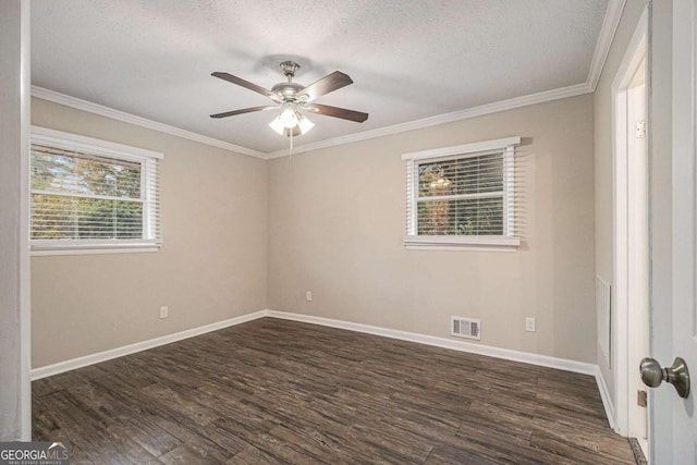 unfurnished room with a textured ceiling, ceiling fan, crown molding, and dark wood-type flooring