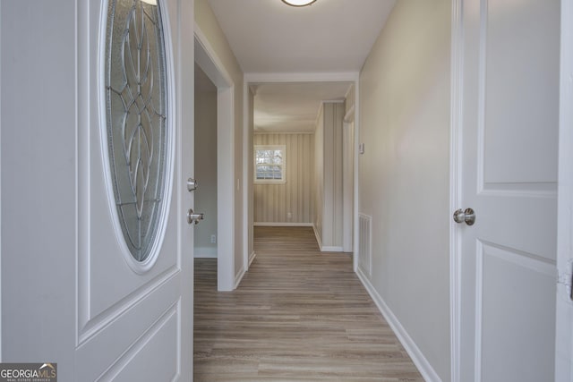 hall with light wood-type flooring