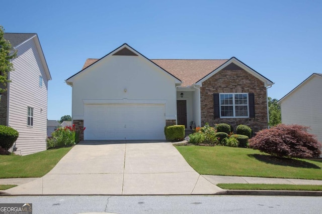 single story home featuring a front lawn and a garage