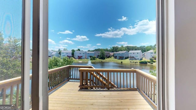 deck featuring a water view