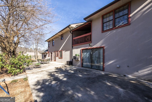 rear view of house with a patio