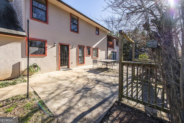 rear view of house featuring a patio