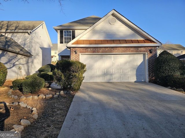 view of front of home with a garage