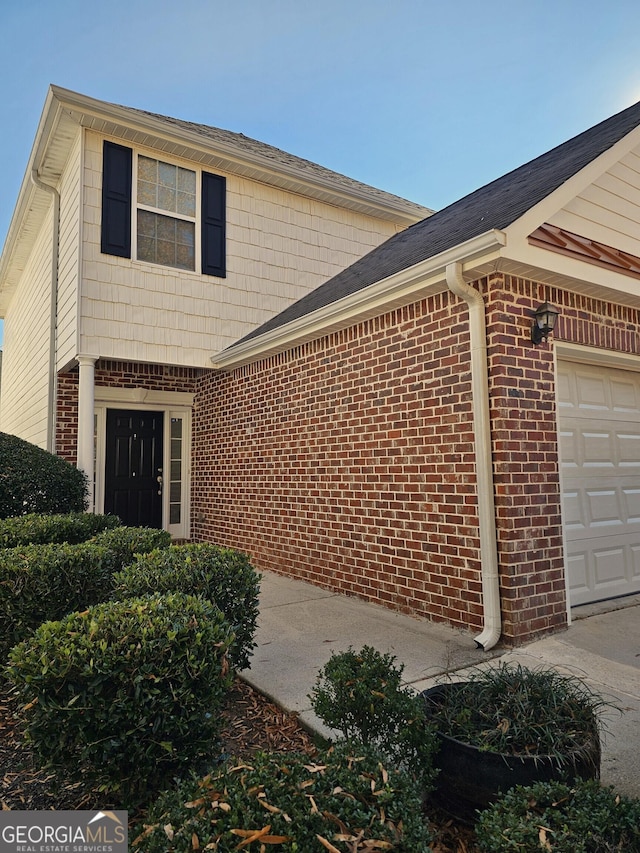 exterior space featuring a garage