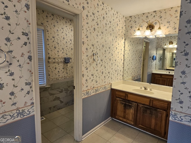 bathroom with tile patterned floors and vanity