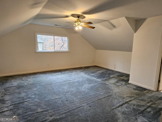 full bathroom with vanity, shower / tub combo, and toilet