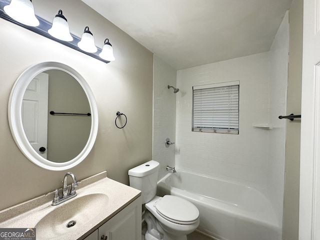 full bathroom featuring vanity, toilet, and tiled shower / bath combo