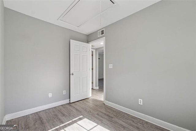 empty room featuring light hardwood / wood-style floors