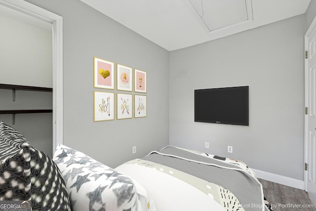 bedroom featuring wood-type flooring