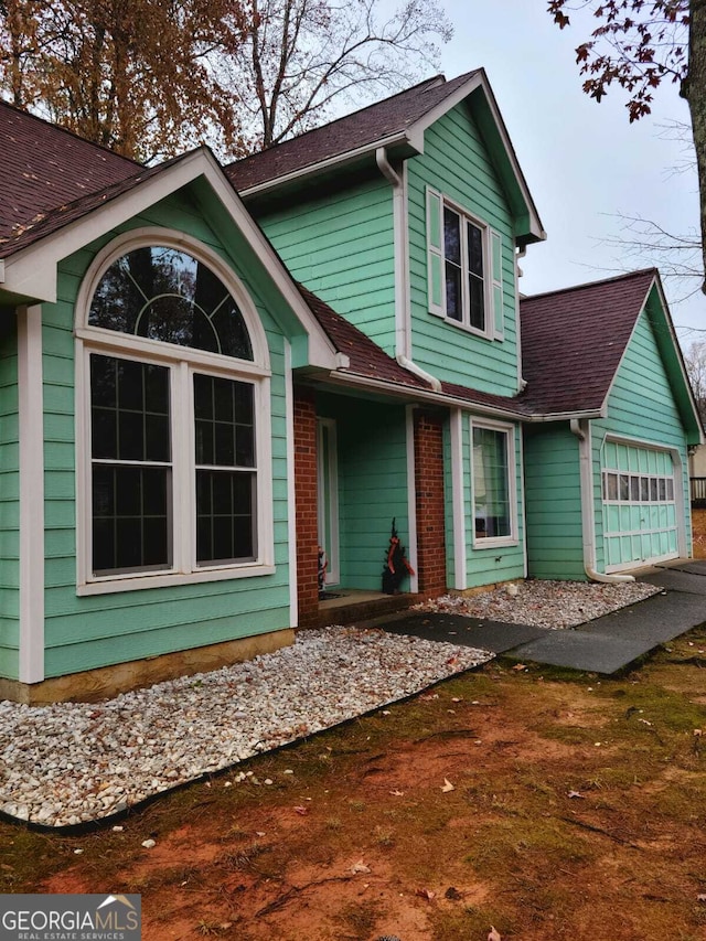 view of front of house with a garage