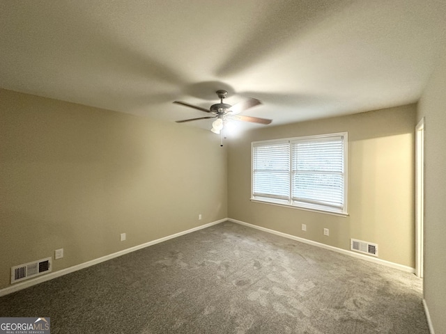 carpeted empty room with ceiling fan