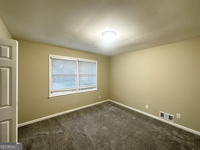 empty room featuring carpet