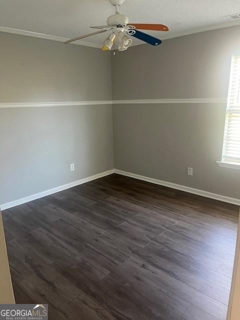 unfurnished room with ceiling fan, dark hardwood / wood-style flooring, and a textured ceiling