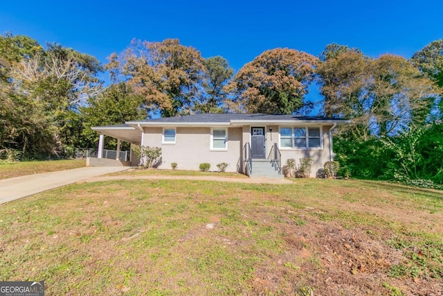 ranch-style house with a carport and a front yard