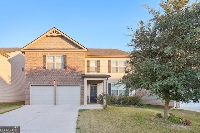 view of front of house with a garage and a front lawn