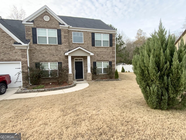 view of front facade with a front lawn