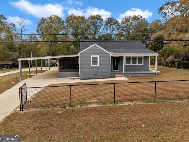 ranch-style house with a front lawn and a carport