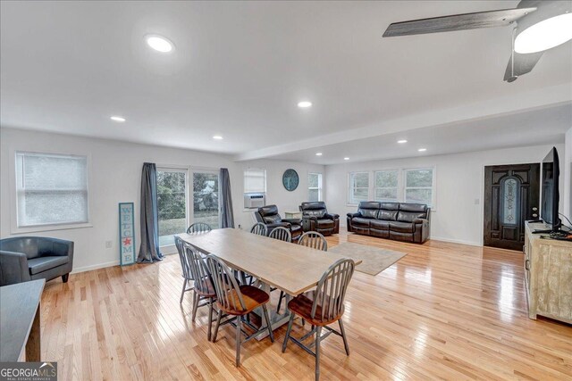 dining space featuring ceiling fan and light hardwood / wood-style floors