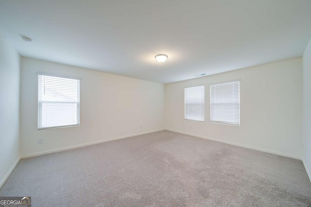 view of carpeted spare room