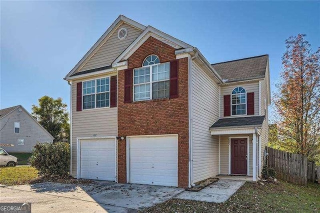 view of front of property featuring a garage