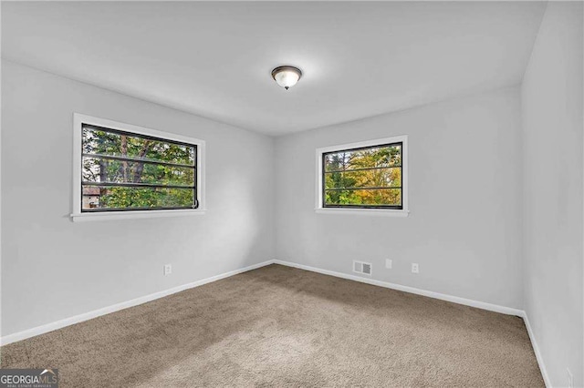 view of carpeted spare room