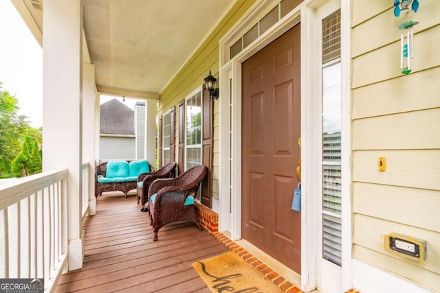 property entrance featuring covered porch