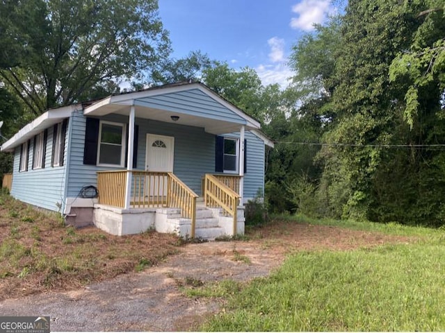 bungalow-style home with a porch