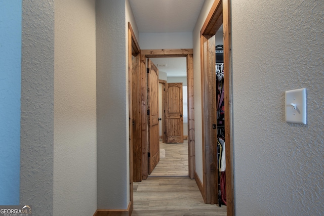 hall featuring light hardwood / wood-style flooring