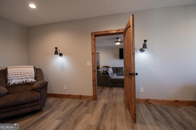 sitting room featuring wood-type flooring