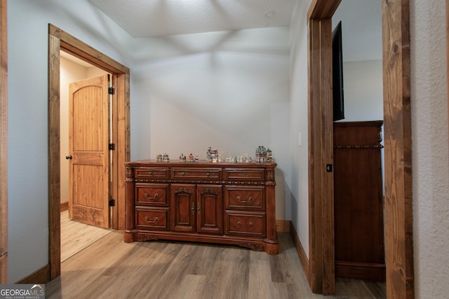 hall featuring light wood-type flooring