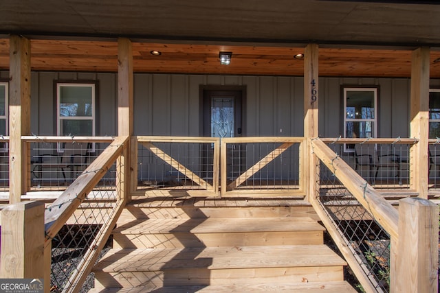 wooden deck featuring covered porch