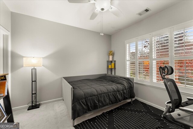 bedroom with carpet and ceiling fan