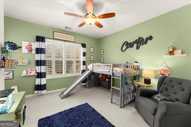 carpeted bedroom featuring ceiling fan