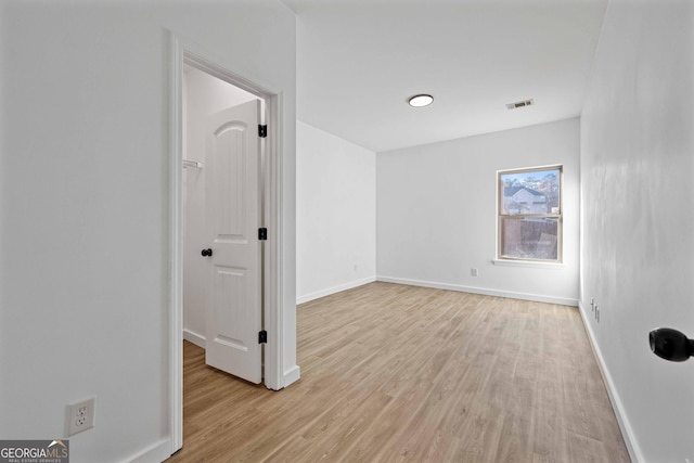 empty room featuring light hardwood / wood-style floors