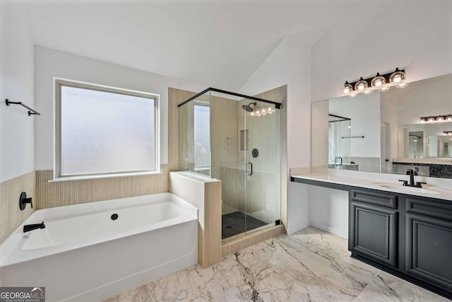 bathroom with separate shower and tub, vanity, and vaulted ceiling