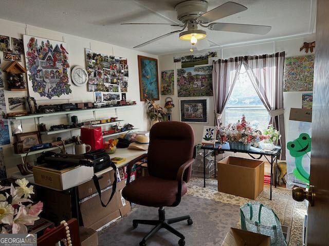 home office with ceiling fan