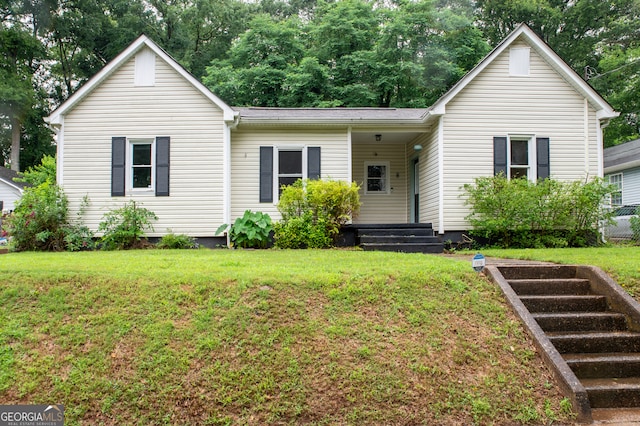 view of front of house with a front lawn