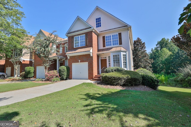 view of front of home featuring a front yard and a garage