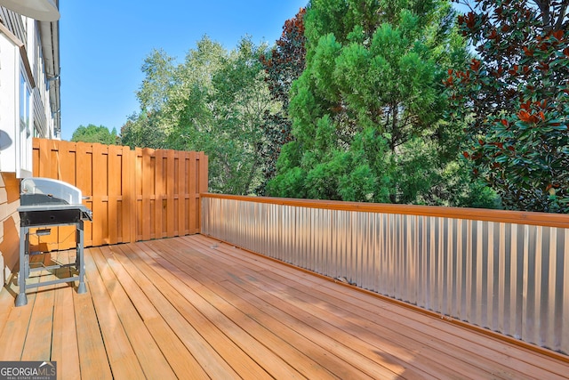 wooden terrace with grilling area